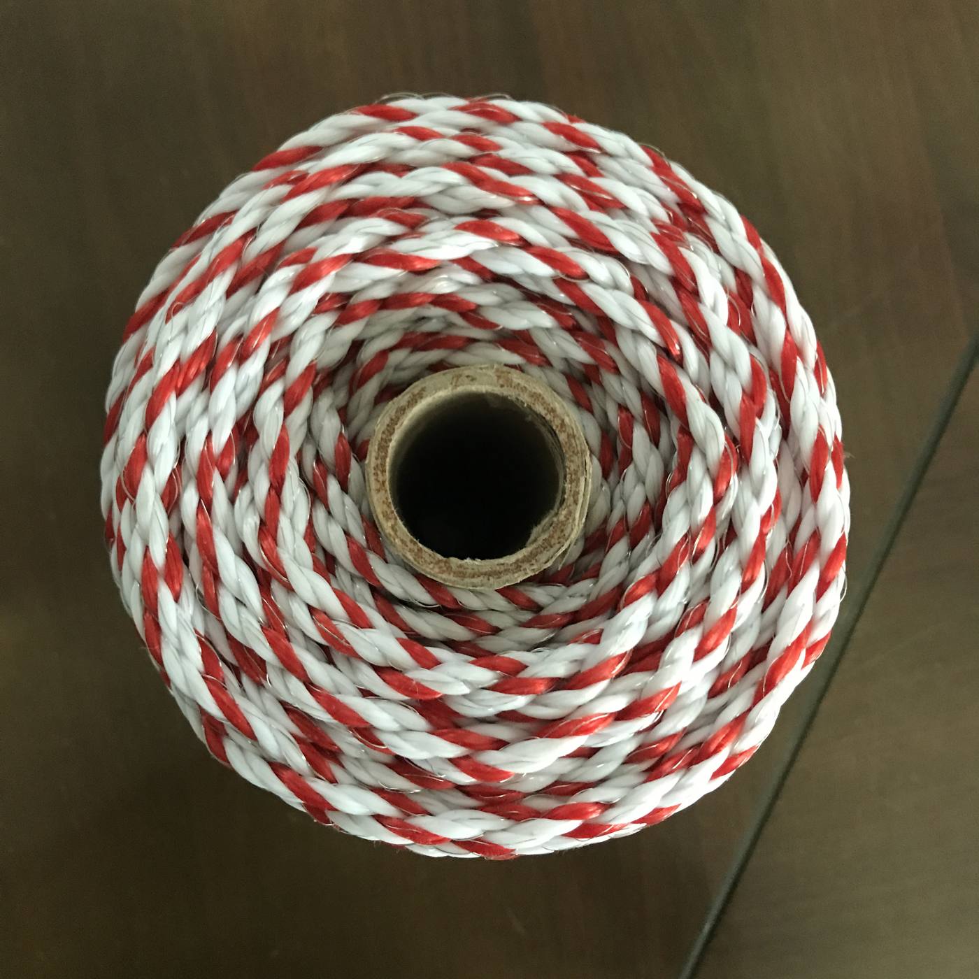 Red and white tracer polyester braided rope coil